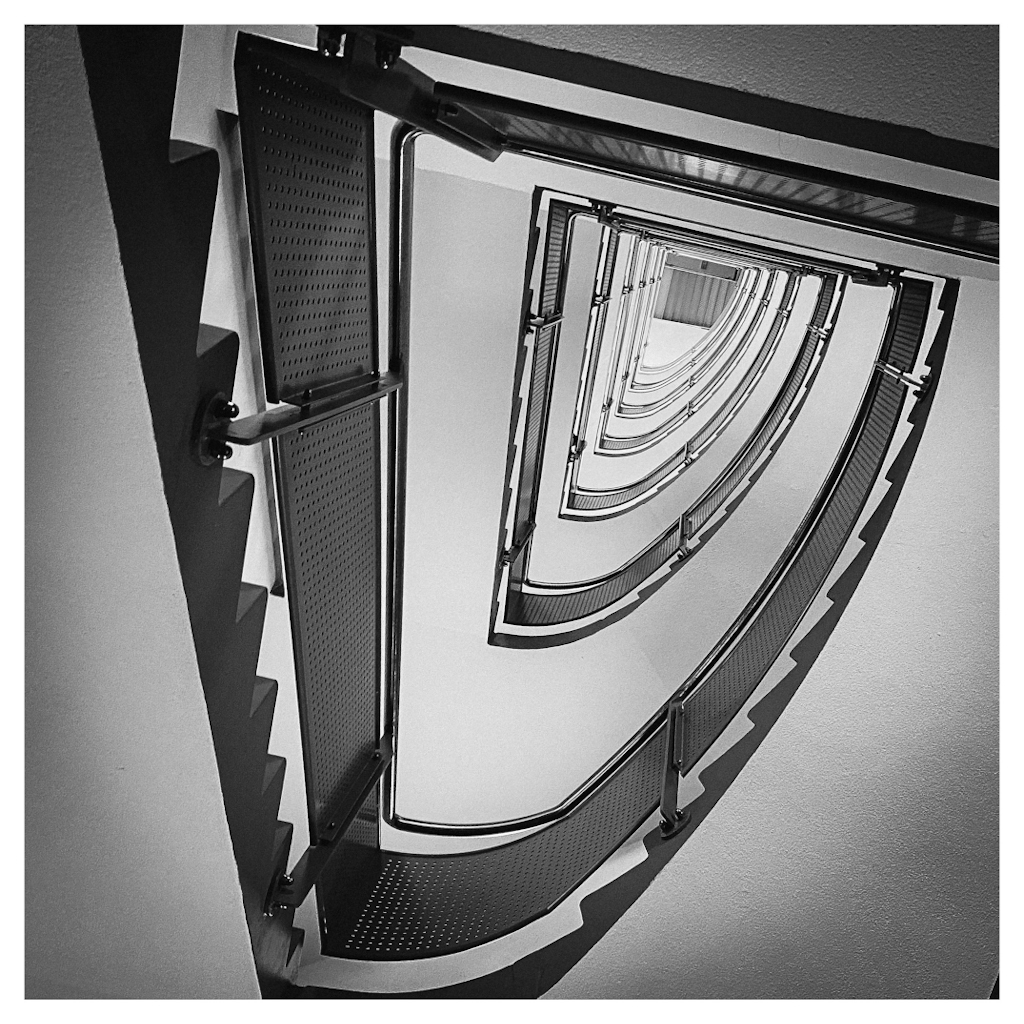 Looking up a long stairway, in B&W