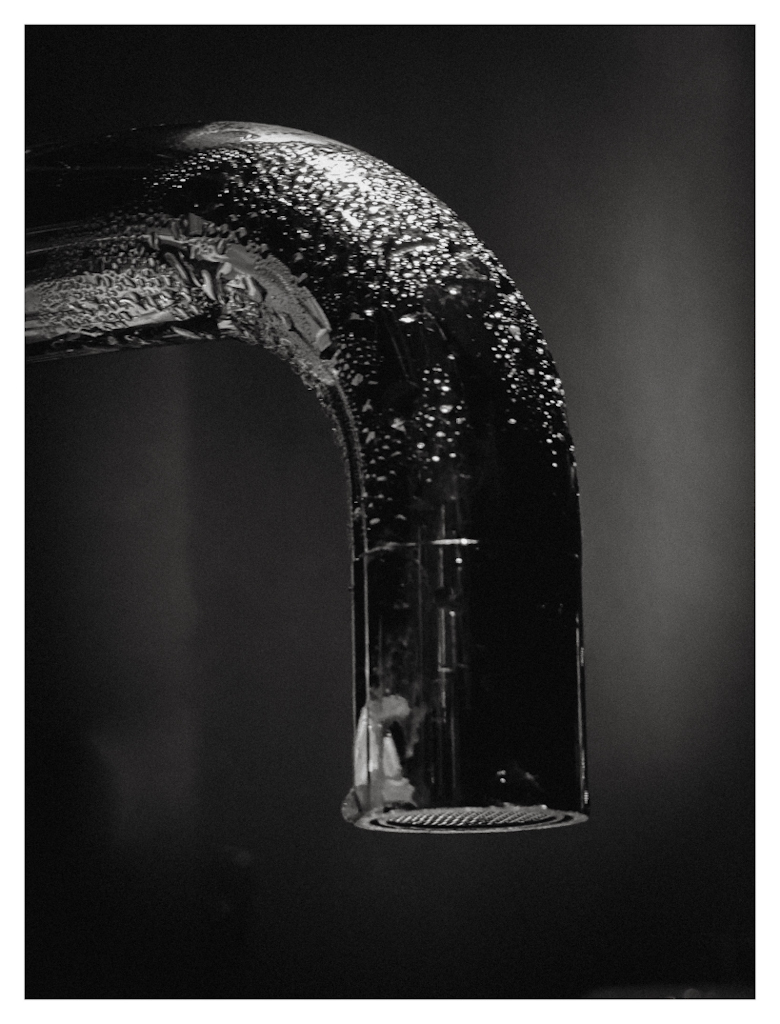 Condensed tap in black and white 